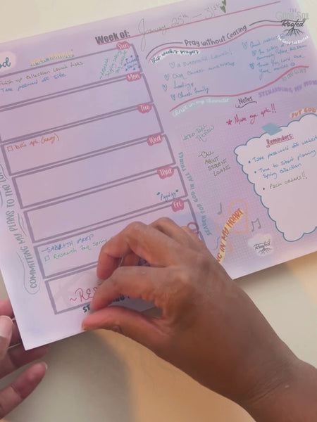 Tearing off the first page of the Walking With God weekly notepad.