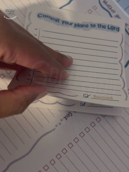 Short clip of hand flipping the pages of 4x4 inch lined notepad from the Walking With God collection.